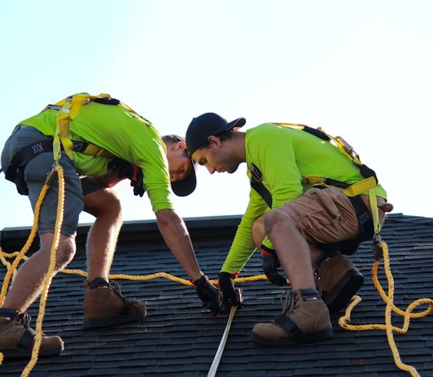 MRB Exteriors crew working on a shingle roof